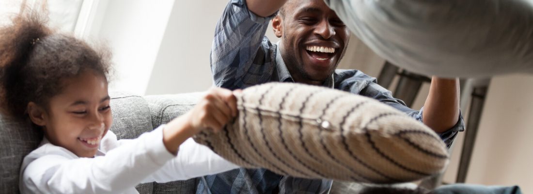 Family having a pillow fight