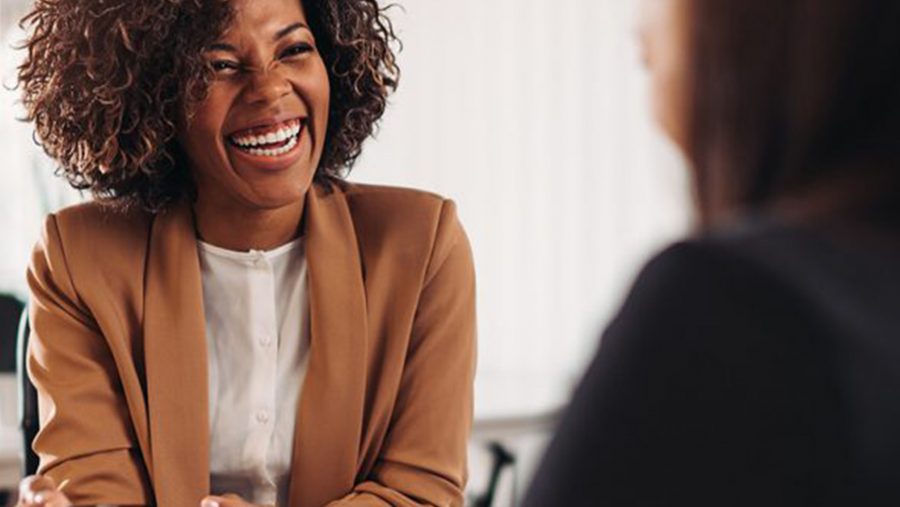 Someone laughing during a conversation