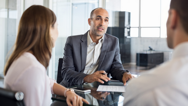 Three people having a discussion