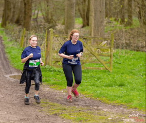 Two people running